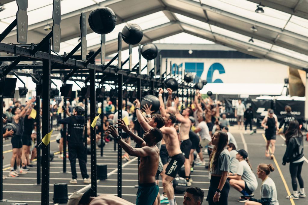 People competing in a HYROX challenge.